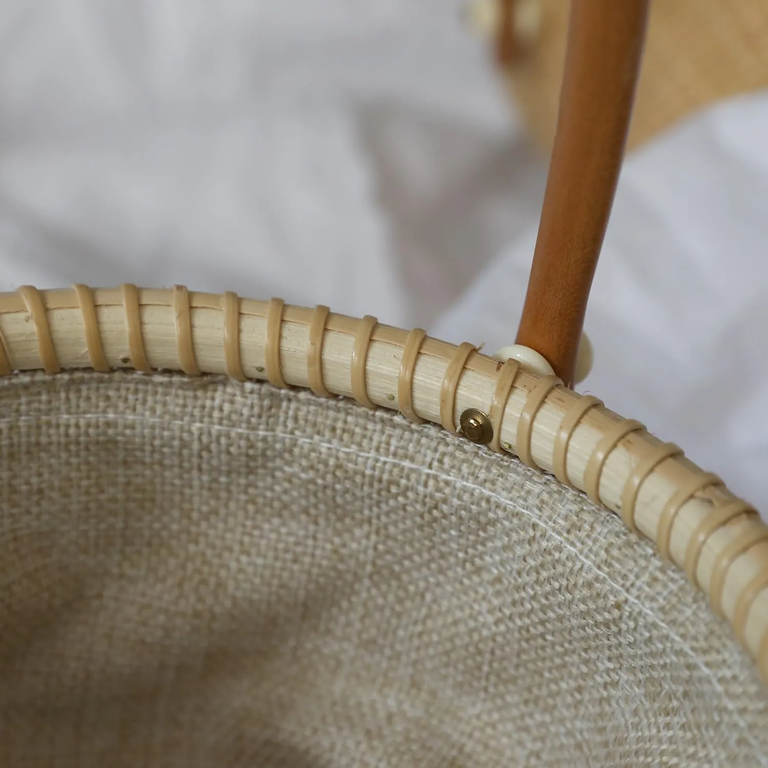 Circular Nantucket Evening Bag handbag Covered Baskets Are Handy Hardwood Swing handles Cane-on-cane weave