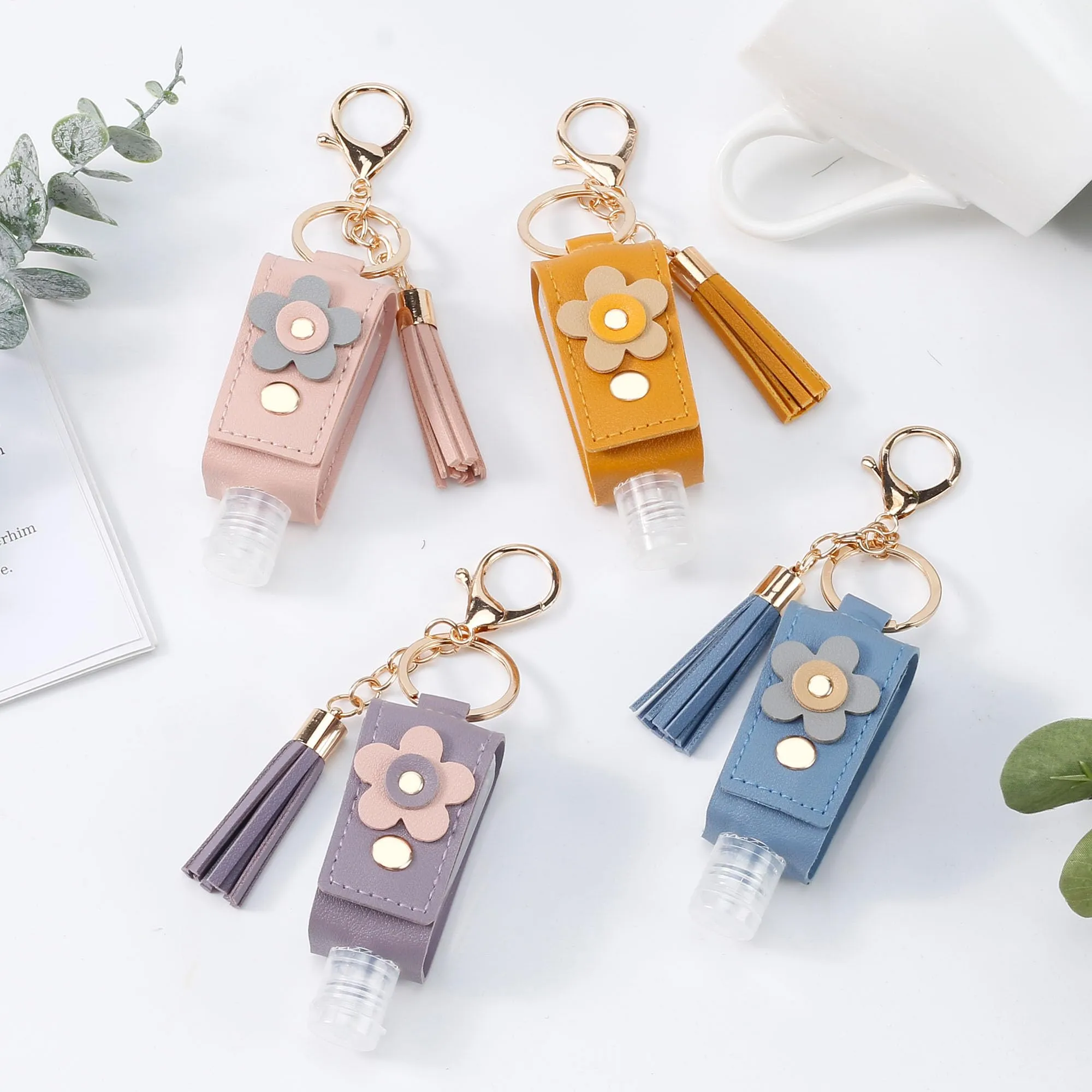 GTILE 4Pcs Hand Sanitizer Keychain, Portable Leather Empty Bottles, 30ml Squeeze Bottle Refillable Containers, Cute Hand Sanitizer for Toiletry Lotion Liquid Soap Shampoo (Pink, Blue, Purple, Yellow)