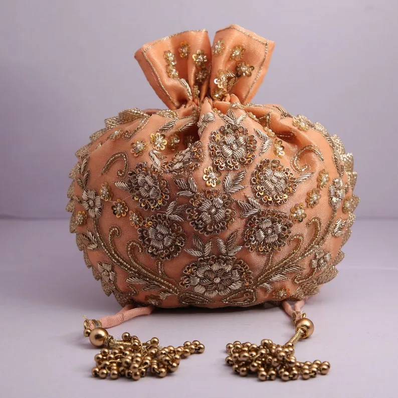 Peach colored embroidered Potli - Rent